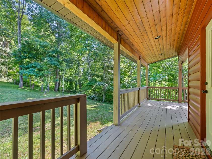 51 Stony Pond Lane, Canton, NC 28716.  MLS# CAR4380850, YatesRealty ID 33499. Side deck leading to upper yard
