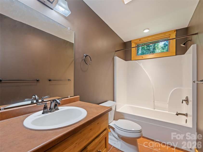 51 Stony Pond Lane, Canton, NC 28716.  MLS# CAR4426561, YatesRealty ID 33499. Bathroom on main floor for great room, second and third bedrooms