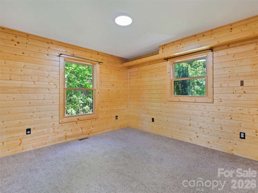 51 Stony Pond Lane, Canton, NC 28716.  MLS# CAR4426561, YatesRealty ID 33499. Second bedroom on main floor, view #1