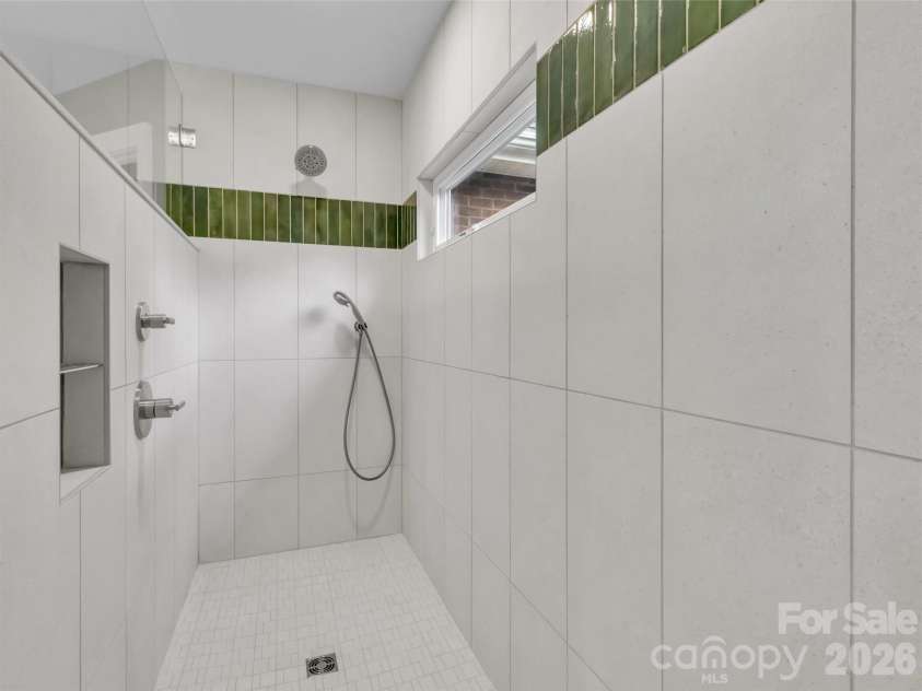 9 Hickory Ridge, Fletcher, NC 28732.  MLS# CAR4395833, YatesRealty ID 33500. Large walk-in shower/primary bath