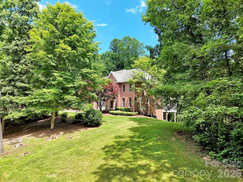 9 Hickory Ridge, Fletcher, NC 28732.  MLS# CAR4395833, YatesRealty ID 33500. Maintained lawn and gardens