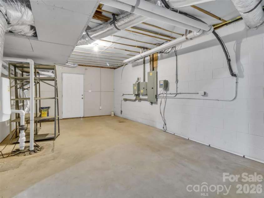 9 Hickory Ridge, Fletcher, NC 28732.  MLS# CAR4395833, YatesRealty ID 33500. Mechanical/storage/potential workshop. outside access