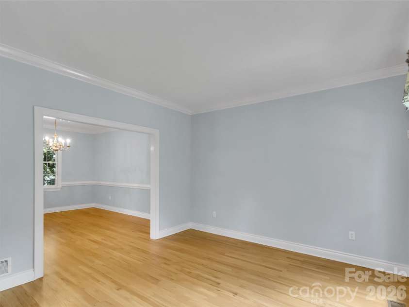 9 Hickory Ridge, Fletcher, NC 28732.  MLS# CAR4395833, YatesRealty ID 33500. Sitting room looking into dining room