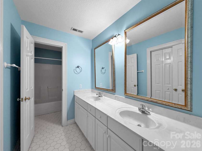 9 Hickory Ridge, Fletcher, NC 28732.  MLS# CAR4395833, YatesRealty ID 33500. Third bathroom upstairs/ double sinks