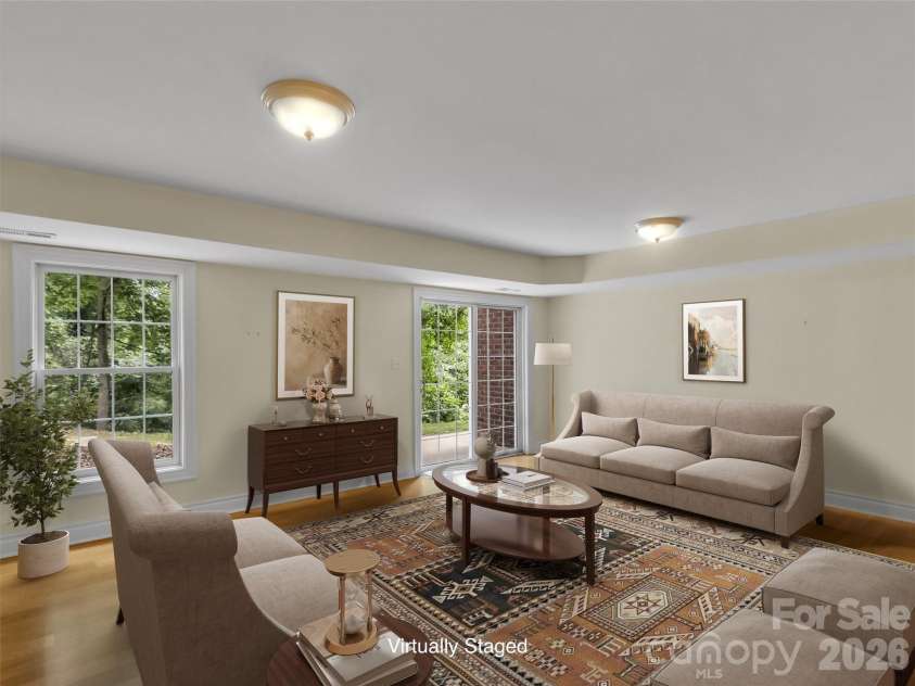 9 Hickory Ridge, Fletcher, NC 28732.  MLS# CAR4395833, YatesRealty ID 33500. Virtually staged lower level gathering room