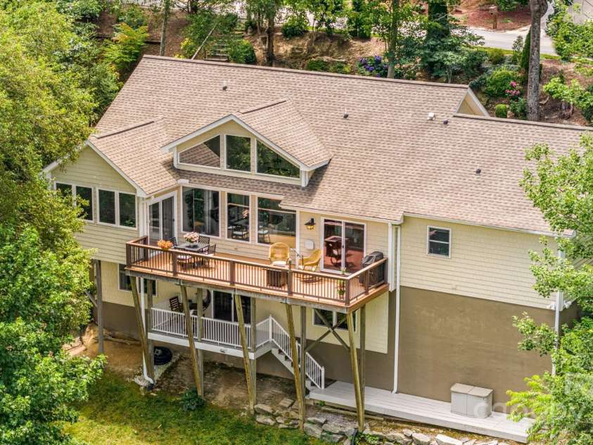 930 Sunlight Ridge Drive, Hendersonville, NC 28792.  MLS# CAR4281569, YatesRealty ID 33501. Exterior Back