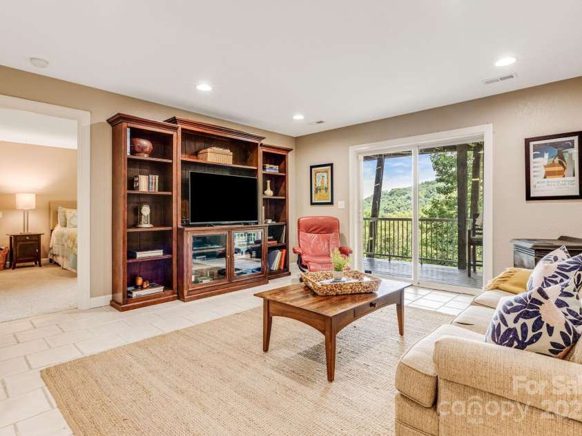 930 Sunlight Ridge Drive, Hendersonville, NC 28792.  MLS# CAR4281569, YatesRealty ID 33501. Gas stove and mountain views