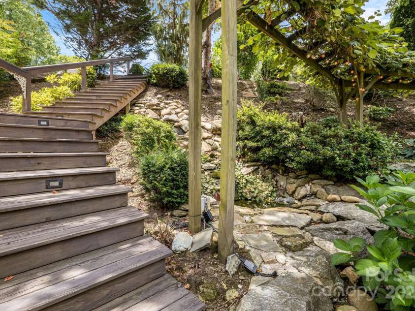 930 Sunlight Ridge Drive, Hendersonville, NC 28792.  MLS# CAR4281569, YatesRealty ID 33501. Perennial Gardens