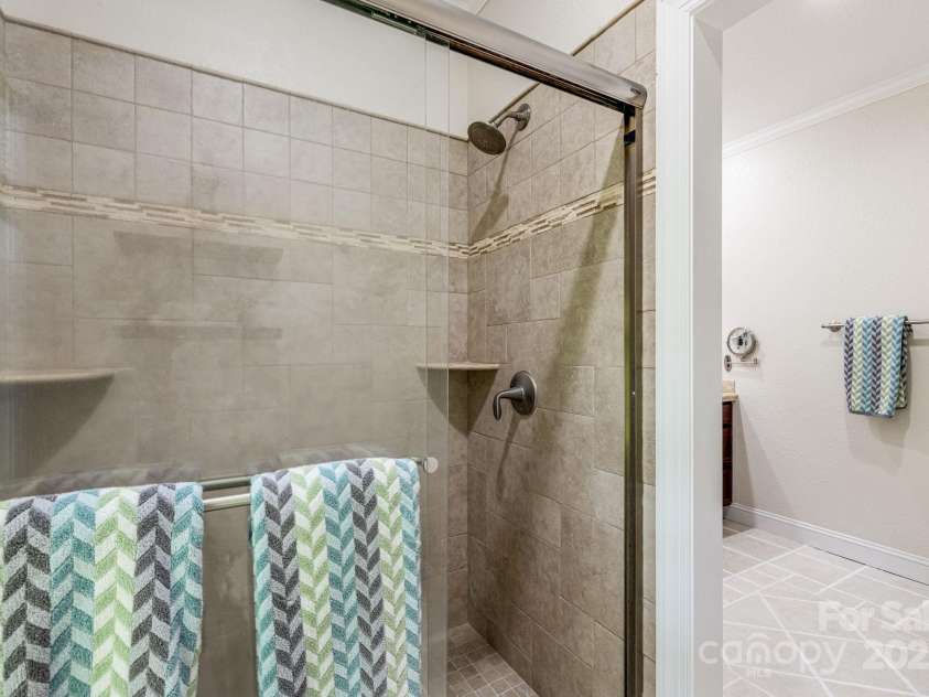 930 Sunlight Ridge Drive, Hendersonville, NC 28792.  MLS# CAR4281569, YatesRealty ID 33501. Tiled Shower