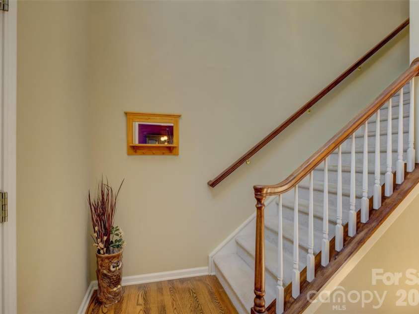 11611 Knightsdale Drive, Charlotte, NC 28277.  MLS# CAR4393388, YatesRealty ID 33502. Stairs to the second floor.