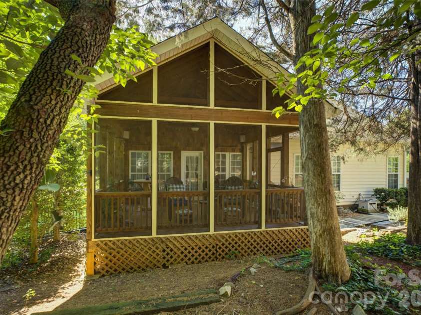 11611 Knightsdale Drive, Charlotte, NC 28277.  MLS# CAR4393388, YatesRealty ID 33502. View of the exterior of the screened porch.