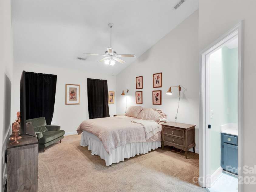 2725 Kirkholm Drive, Matthews, NC 28105.  MLS# CAR4280799, YatesRealty ID 33503. Primary bedroom