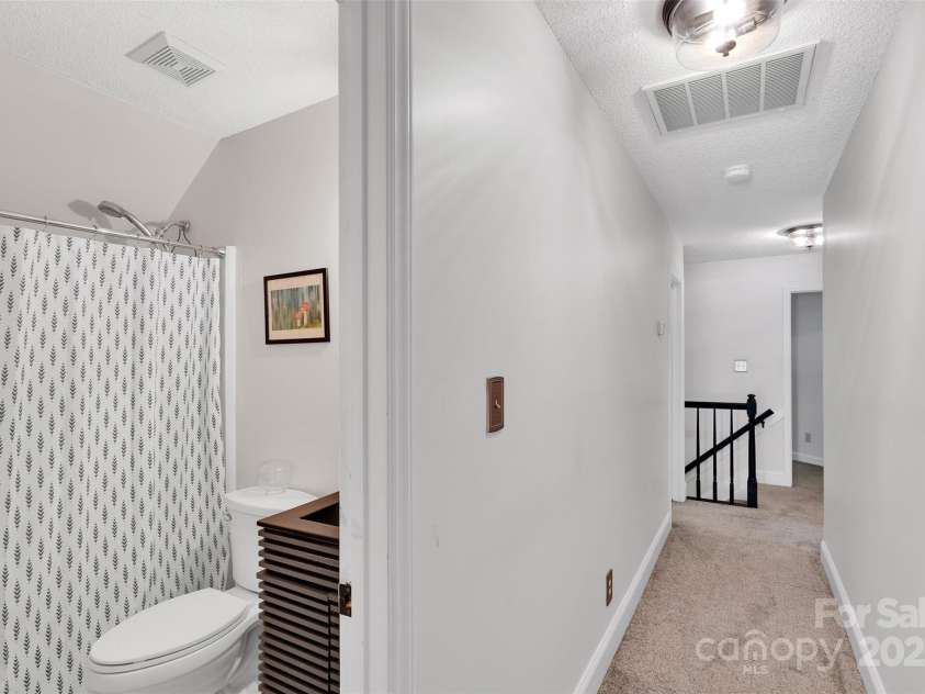 2725 Kirkholm Drive, Matthews, NC 28105.  MLS# CAR4280799, YatesRealty ID 33503. Upstairs hallway