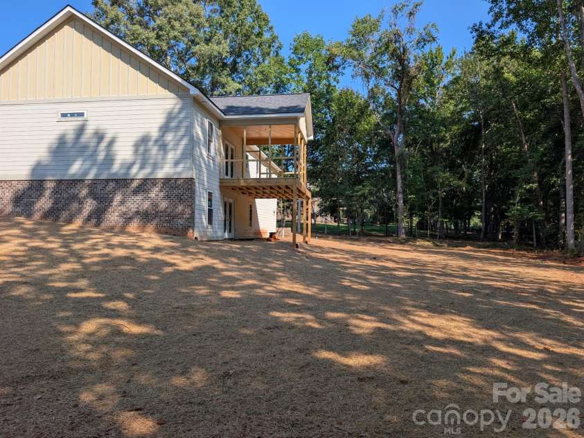 1895 Knolls Drive, Newton, NC 28658.  MLS# CAR4383402, YatesRealty ID 33508. Right side of home view