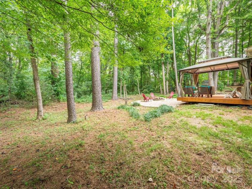 3102 Peggy Ridge Terrace, Matthews, NC 28105.  MLS# CAR4278546, YatesRealty ID 33508. Backyard