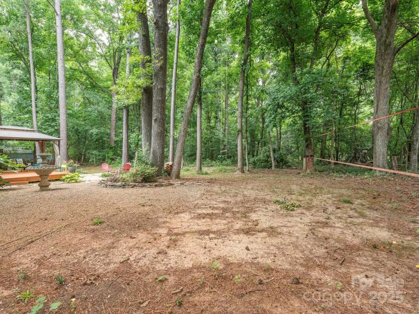 3102 Peggy Ridge Terrace, Matthews, NC 28105.  MLS# CAR4278546, YatesRealty ID 33508. Backyard