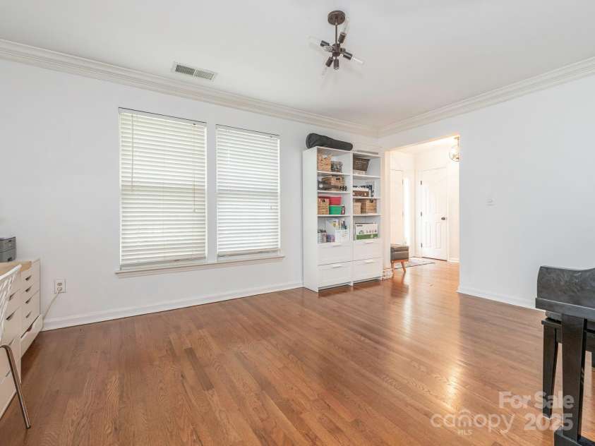 3102 Peggy Ridge Terrace, Matthews, NC 28105.  MLS# CAR4278546, YatesRealty ID 33508. Formal Front Facing living room