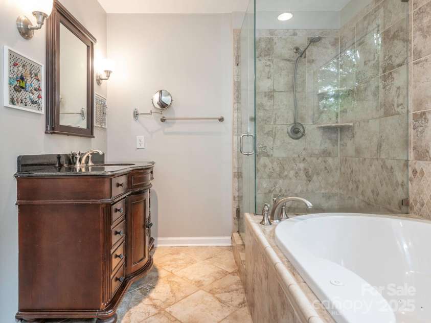 3102 Peggy Ridge Terrace, Matthews, NC 28105.  MLS# CAR4278546, YatesRealty ID 33508. Primary Bathroom