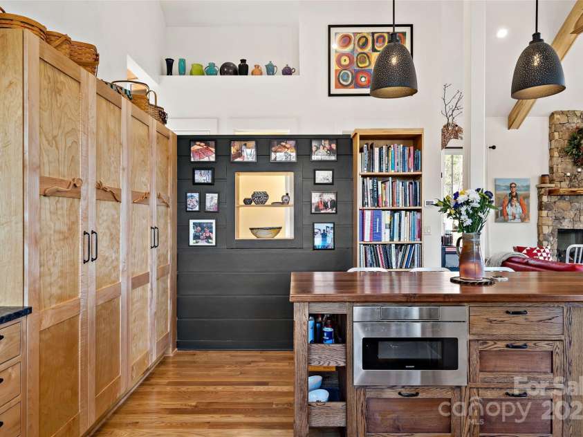 159 Settings Boulevard, Black Mountain, NC 28711.  MLS# CAR4237970, YatesRealty ID 3351. Current owner created all of the cabinets and storage in this home.
