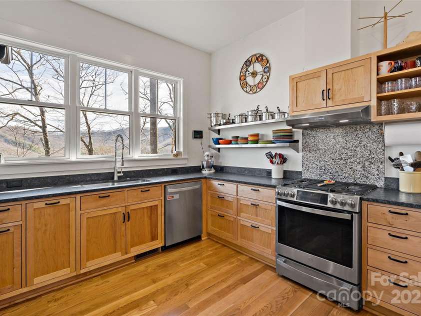 159 Settings Boulevard, Black Mountain, NC 28711.  MLS# CAR4237970, YatesRealty ID 3351. Custom maple cabinets throughout