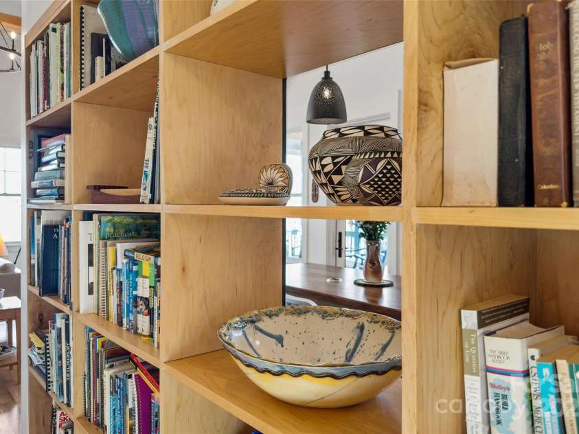 159 Settings Boulevard, Black Mountain, NC 28711.  MLS# CAR4237970, YatesRealty ID 3351. Custom shelving and cabinetry throughout the home.