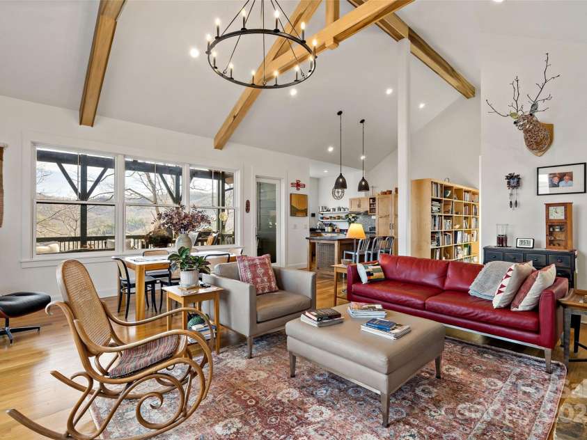 159 Settings Boulevard, Black Mountain, NC 28711.  MLS# CAR4237970, YatesRealty ID 3351. Custom wood beams and lighting throughout the home.