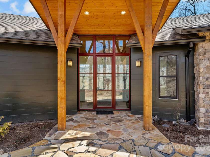 159 Settings Boulevard, Black Mountain, NC 28711.  MLS# CAR4237970, YatesRealty ID 3351. Outdoor porch entry area
