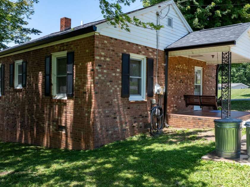 111 Cross Memorial Avenue, Morganton, NC 28655.  MLS# CAR4395304, YatesRealty ID 33511. Side facing the driveway.