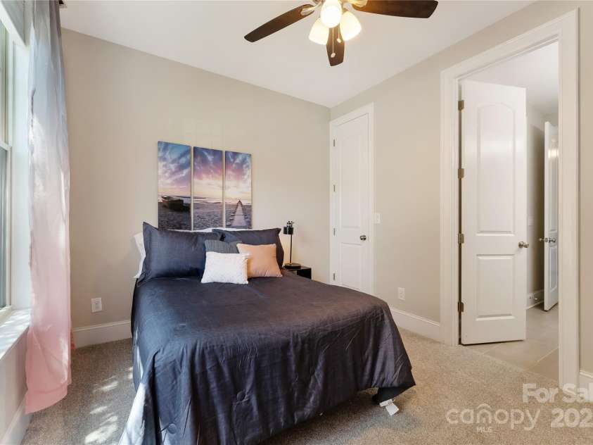 1906 Pensco Pond Court, Waxhaw, NC 28173.  MLS# CAR4266619, YatesRealty ID 33515. Bedroom 2 Downstairs with walk in closet