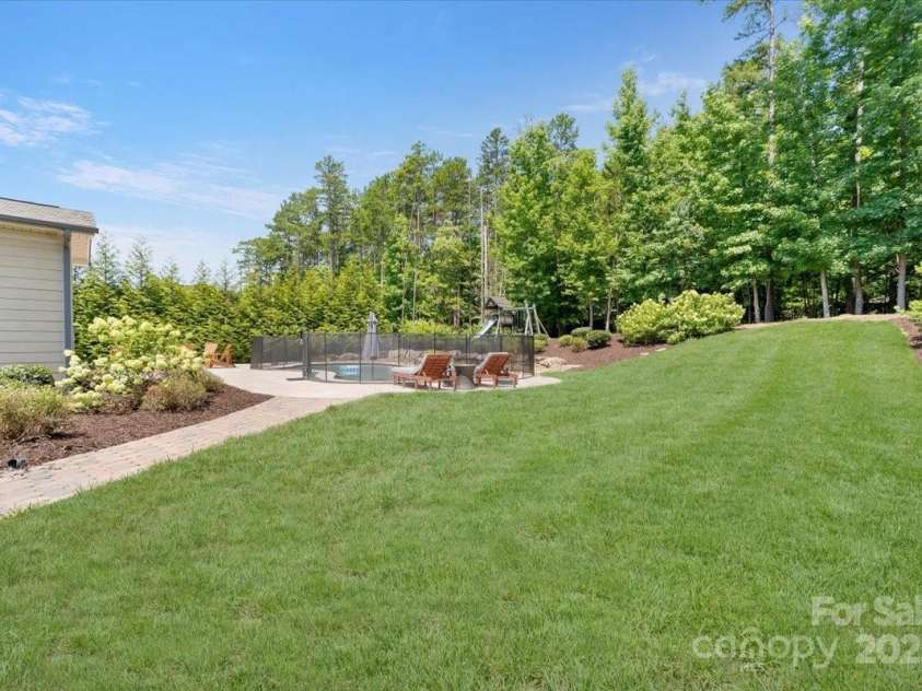 1906 Pensco Pond Court, Waxhaw, NC 28173.  MLS# CAR4266619, YatesRealty ID 33515. Fully fenced in back yard