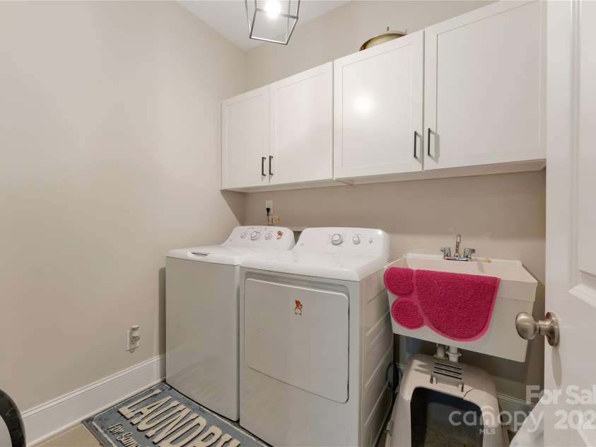 1906 Pensco Pond Court, Waxhaw, NC 28173.  MLS# CAR4266619, YatesRealty ID 33515. Laundry room downstairs