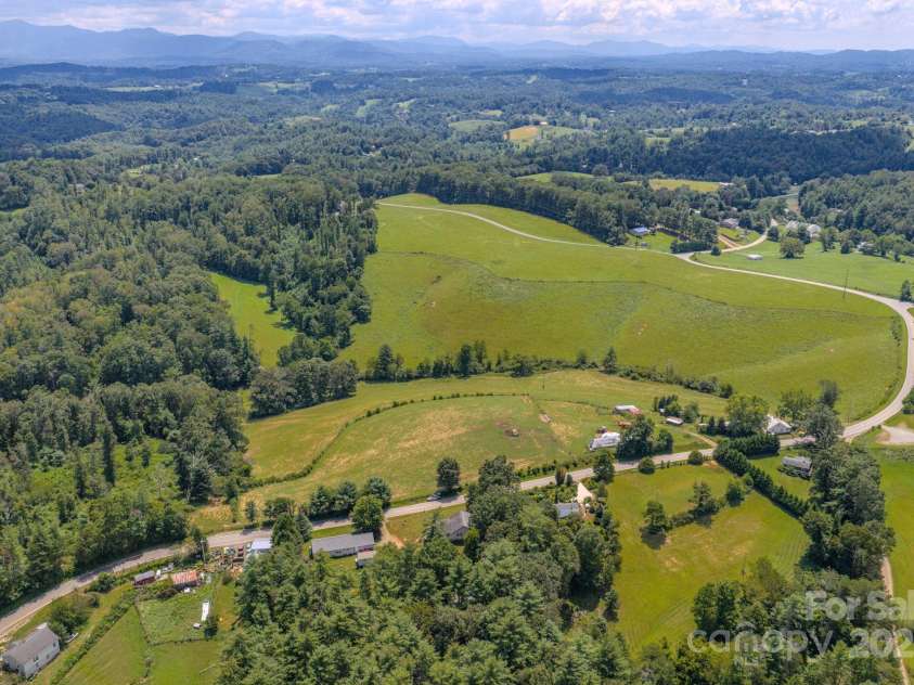 2606 Bear Creek Road, Marshall, NC 28753.  MLS# CAR4287238, YatesRealty ID 33517. Aerial, pasture views