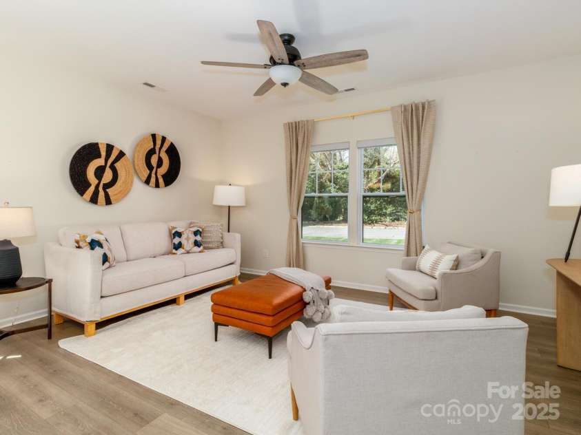 3200 Cosby Place, Charlotte, NC 28205.  MLS# CAR4239425, YatesRealty ID 3352. High ceilings, sunny living room.