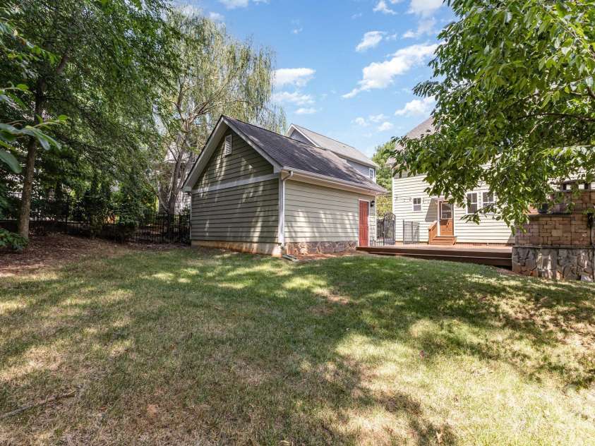 10120 Roosevelt Drive, Huntersville, NC 28078.  MLS# CAR4271359, YatesRealty ID 33526. Treed flat yard