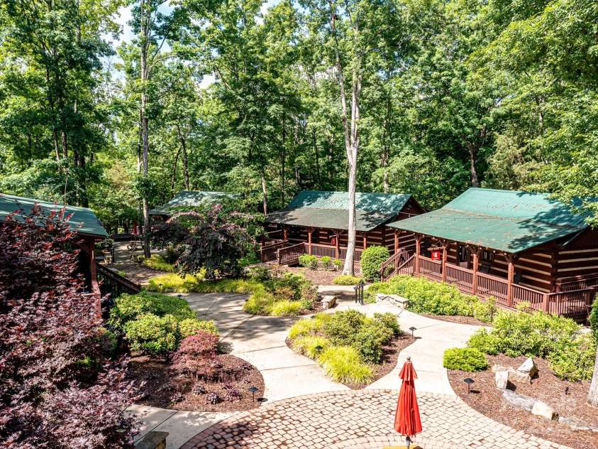 1619 Tranquility Boulevard, Lancaster, SC 29720.  MLS# CAR4289750, YatesRealty ID 33527. Village Cabins Host Smaller Venues such as Billiards, Cards, Crafts, Sewing, Postal Center, Yoga and More. Picnic Areas too!