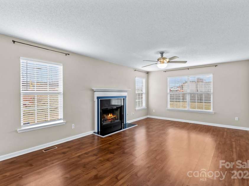 105 Secretariat Lane, Mooresville, NC 28117.  MLS# CAR4285718, YatesRealty ID 33528. Another view of the Living Room , (Gas logs do not convey).