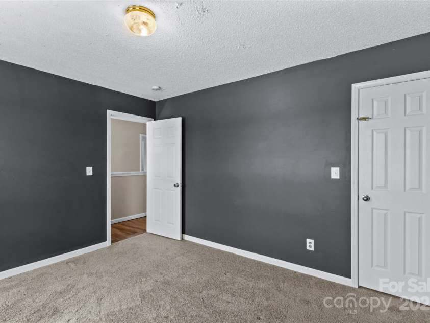 105 Secretariat Lane, Mooresville, NC 28117.  MLS# CAR4285718, YatesRealty ID 33528. Bedroom Three is also a good size .