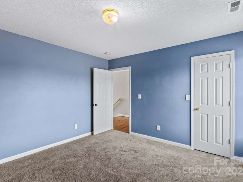 105 Secretariat Lane, Mooresville, NC 28117.  MLS# CAR4285718, YatesRealty ID 33528. Bedroom two is a good size room .