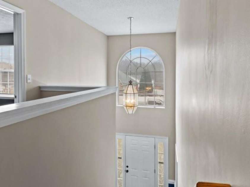 105 Secretariat Lane, Mooresville, NC 28117.  MLS# CAR4285718, YatesRealty ID 33528. Looking down to the foyer from the upstairs.