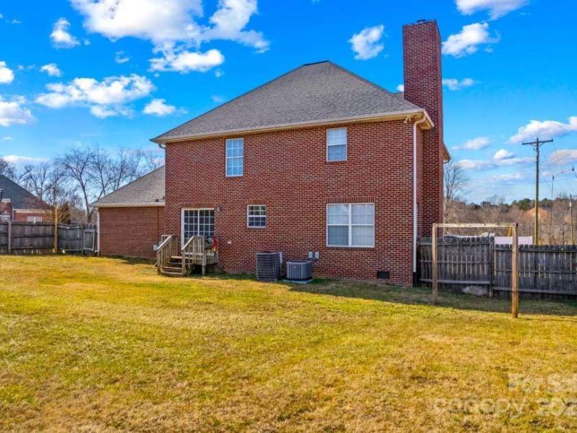 105 Secretariat Lane, Mooresville, NC 28117.  MLS# CAR4285718, YatesRealty ID 33528. View of the backyard ! . NO HOA nor any HOA Dues , Mooresville Graded School District . City water and City Sewer per the sellers.  Copy of Any Easements have been provided in the Media section of MLS.