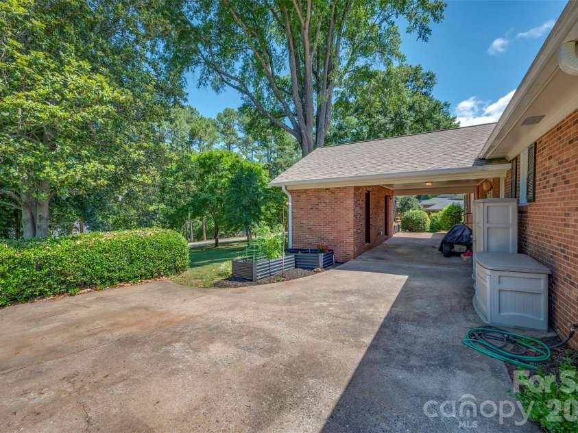 271 McCall Drive, Forest City, NC 28043.  MLS# CAR4394926, YatesRealty ID 33529. Side of Home