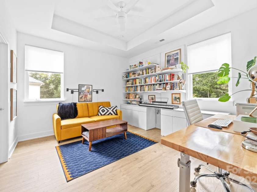 102 Mattoon Street, Charlotte, NC 28216.  MLS# CAR4291152, YatesRealty ID 33532. Did you notice these secondary rooms both have tray ceilings (10' tall) and ceiling fans?! And the windows... HELLO?!?!