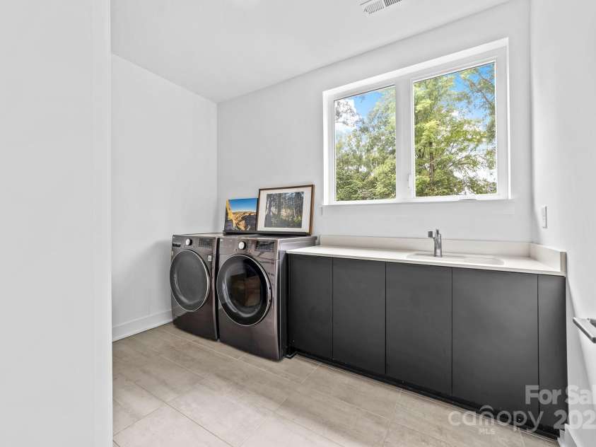 102 Mattoon Street, Charlotte, NC 28216.  MLS# CAR4291152, YatesRealty ID 33532. HUGE laundry room to store all your stuff, have pet spa days, and would be perfect for a litter box.. just saying...