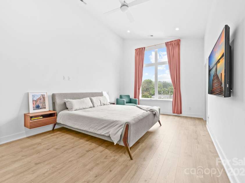102 Mattoon Street, Charlotte, NC 28216.  MLS# CAR4291152, YatesRealty ID 33532. No seriously.. you can not only see the entire street, but you can also see the city from the primary bedroom!