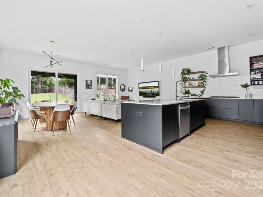 102 Mattoon Street, Charlotte, NC 28216.  MLS# CAR4291152, YatesRealty ID 33532. Open concept living space is PERFECT for entertaining... and zoomies.