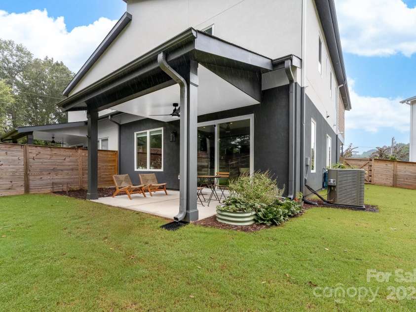 102 Mattoon Street, Charlotte, NC 28216.  MLS# CAR4291152, YatesRealty ID 33532. This backyard is also perfect for chilling. Covered patio with a ceiling fan! Perfect for relaxing outside, grillin out, backyard parties, beer olympics (21+) and the like! LIMITLESS POSSIBILITIES