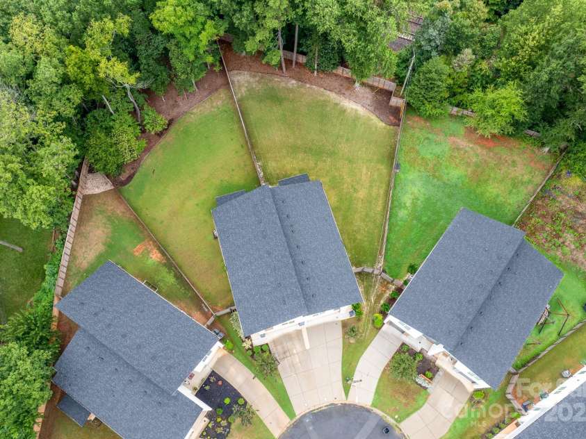 102 Mattoon Street, Charlotte, NC 28216.  MLS# CAR4291152, YatesRealty ID 33532. Your dog is going to LOVE the fully fenced in back yard.