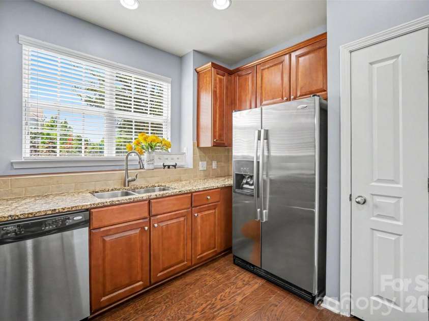 717 River Park Road, Belmont, NC 28012.  MLS# CAR4385377, YatesRealty ID 33535. Fully equipped light-filled kitchen!