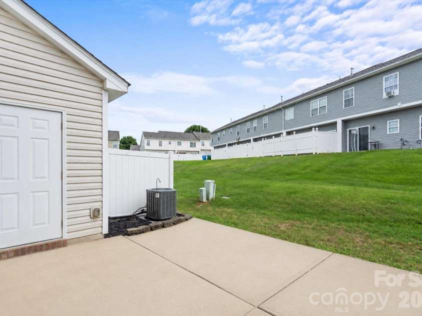 10563 Stoneacre Court, Pineville, NC 28134.  MLS# CAR4428184, YatesRealty ID 33537. Extended Patio w/ Additional Storage