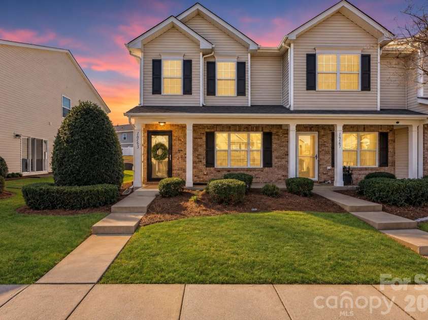 10563 Stoneacre Court, Pineville, NC 28134.  MLS# CAR4428184, YatesRealty ID 33537. Front Exterior at dusk - *Photo has been virtually enhanced